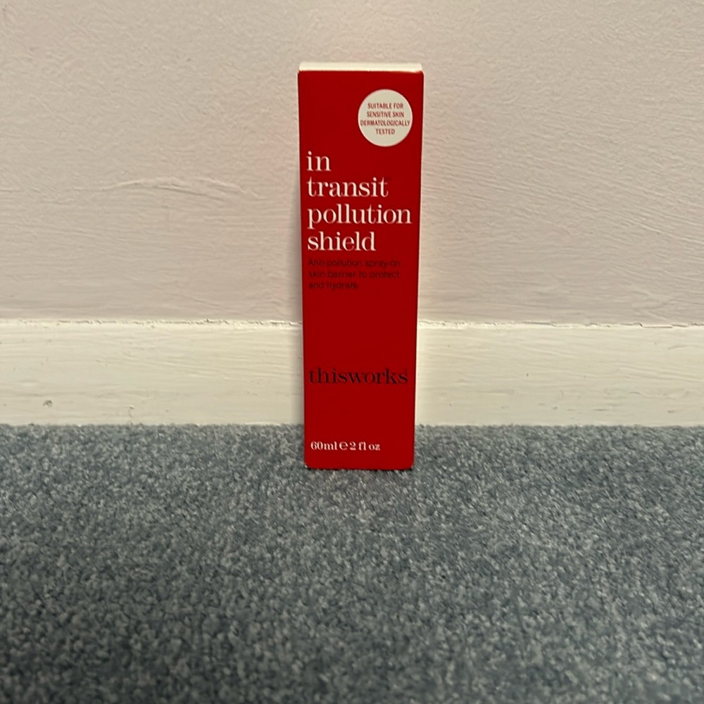 In transit pollution shield spray